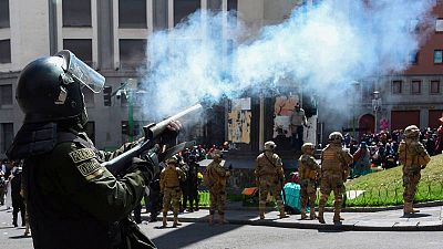 Policía disparando en la protestas de Bolivia, Foto: Rtve